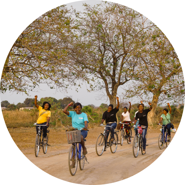 CAMFED leaders riding bicycles